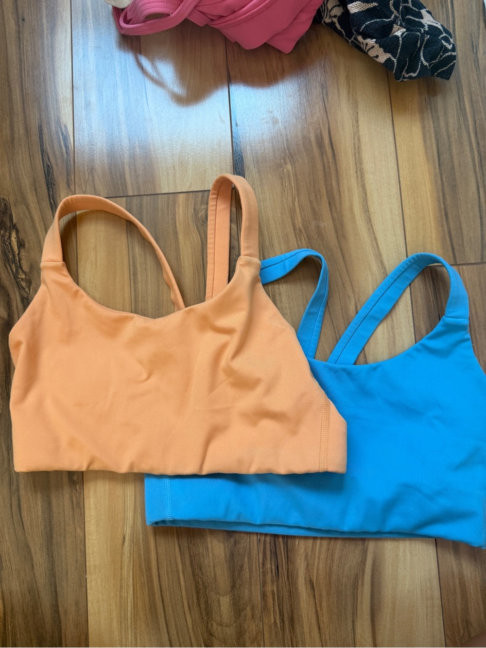 Bundle of 2 Girlfriend Collective peach and blue sports bras
